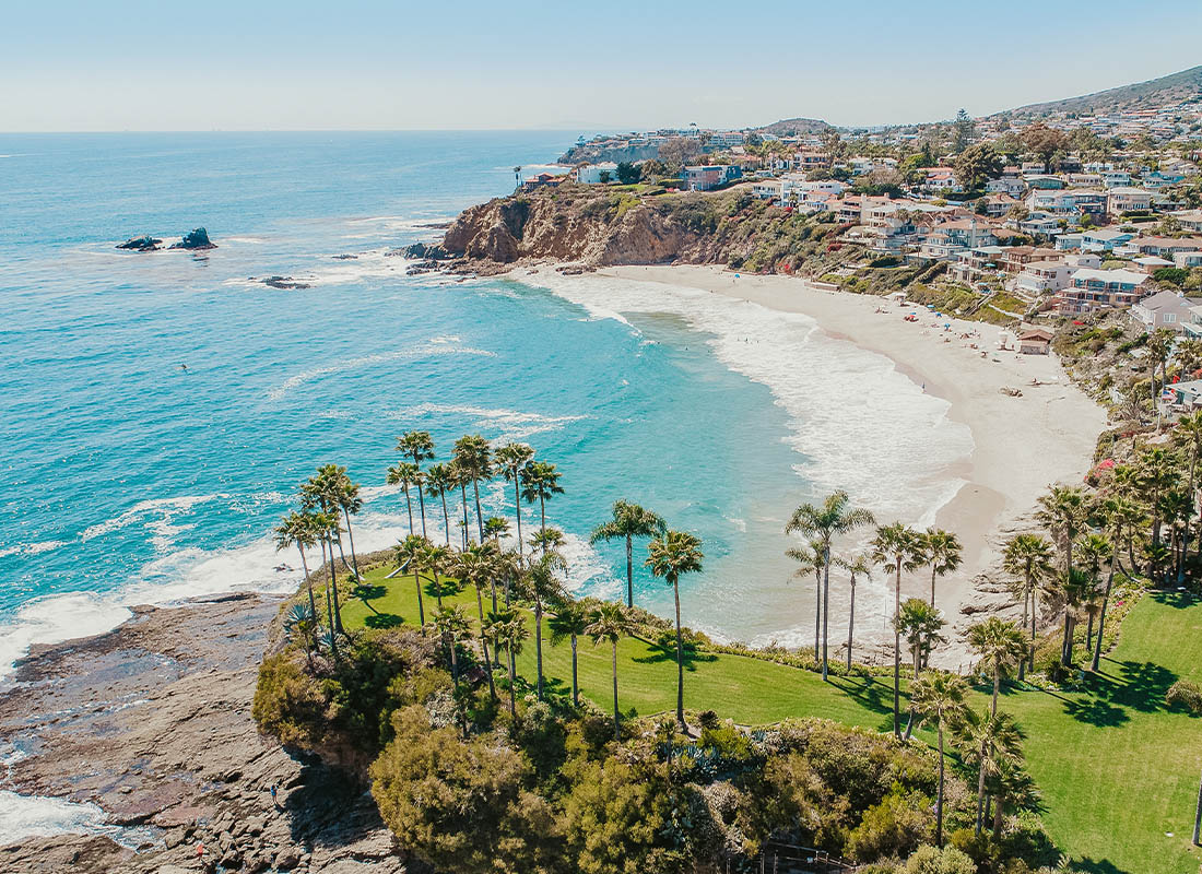 California Auto, Home & Life Insurance Coverage - Aerial View of Ocean and Laguna Beach in California on a Sunny Day
